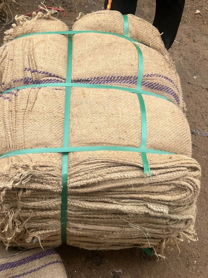 Jute sacks strapped into a compact bale